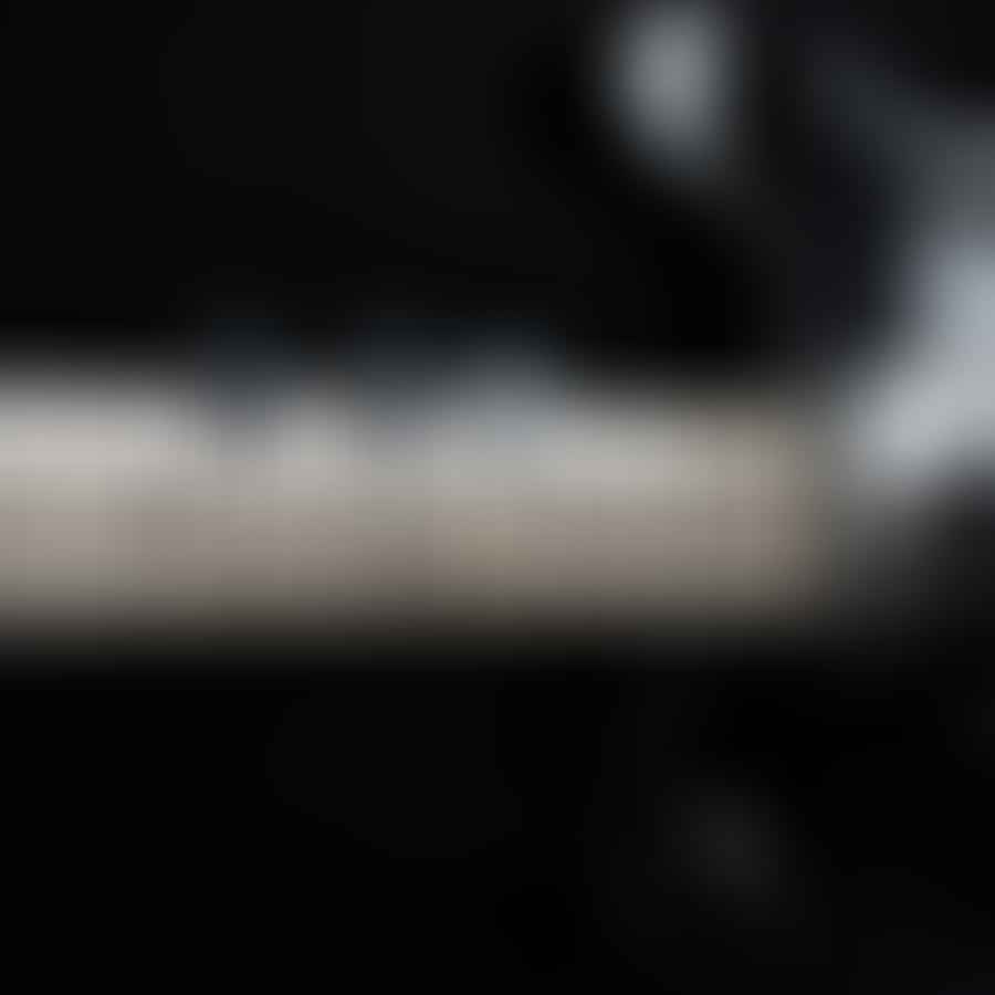 Close-up image of a variety of guitar picks