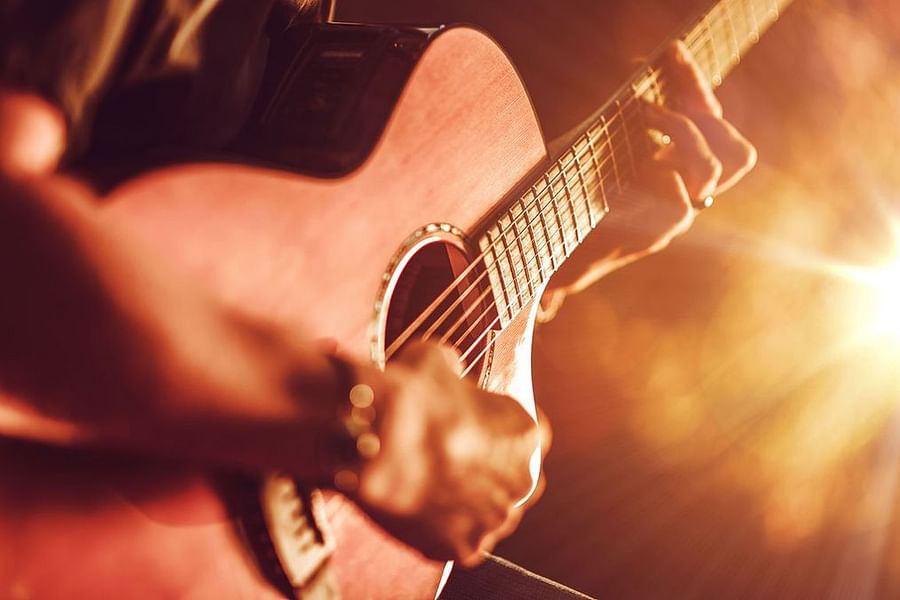 1970s singer-songwriter acoustic guitar