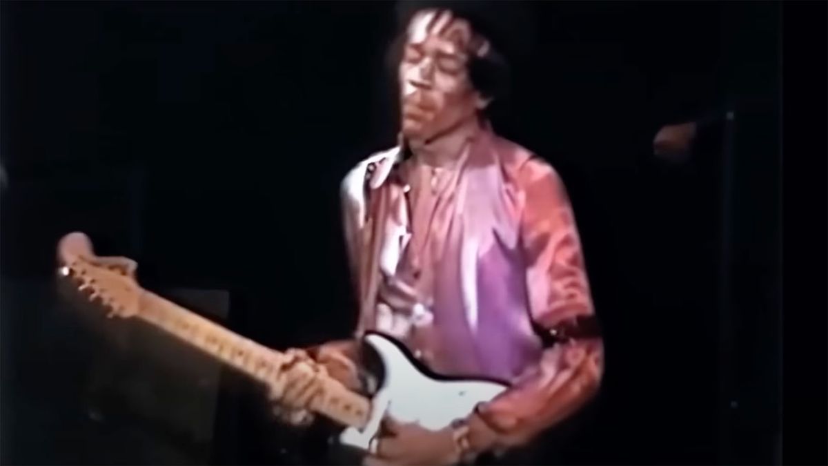 Jimi Hendrix playing guitar