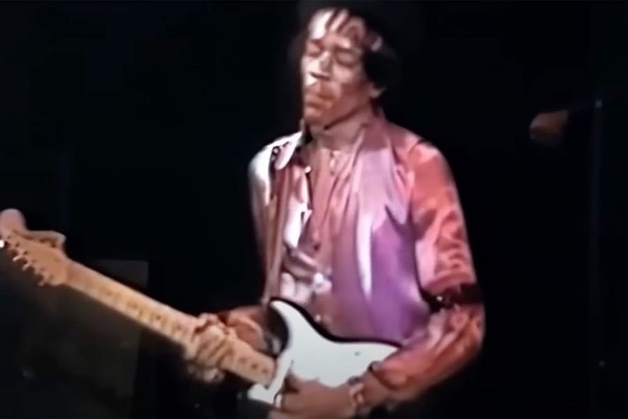 Jimi Hendrix playing guitar