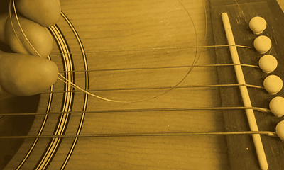 Can I repair broken guitar strings at home?