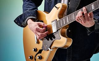 How can advanced guitarists improve their acoustic guitar playing skills?