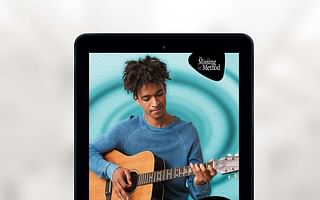 How can I progress from being a beginner to an intermediate guitarist?