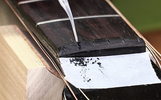 How to repair a guitar nut?