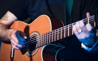 Should tabs be learned before chords in guitar playing?