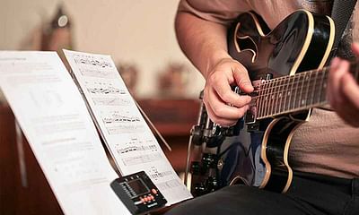What are some affordable alternatives to guitar lessons?