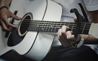 What are some tips for improving fingerpicking technique on the guitar?
