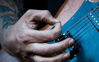 What are some tips for playing the guitar with good tone?